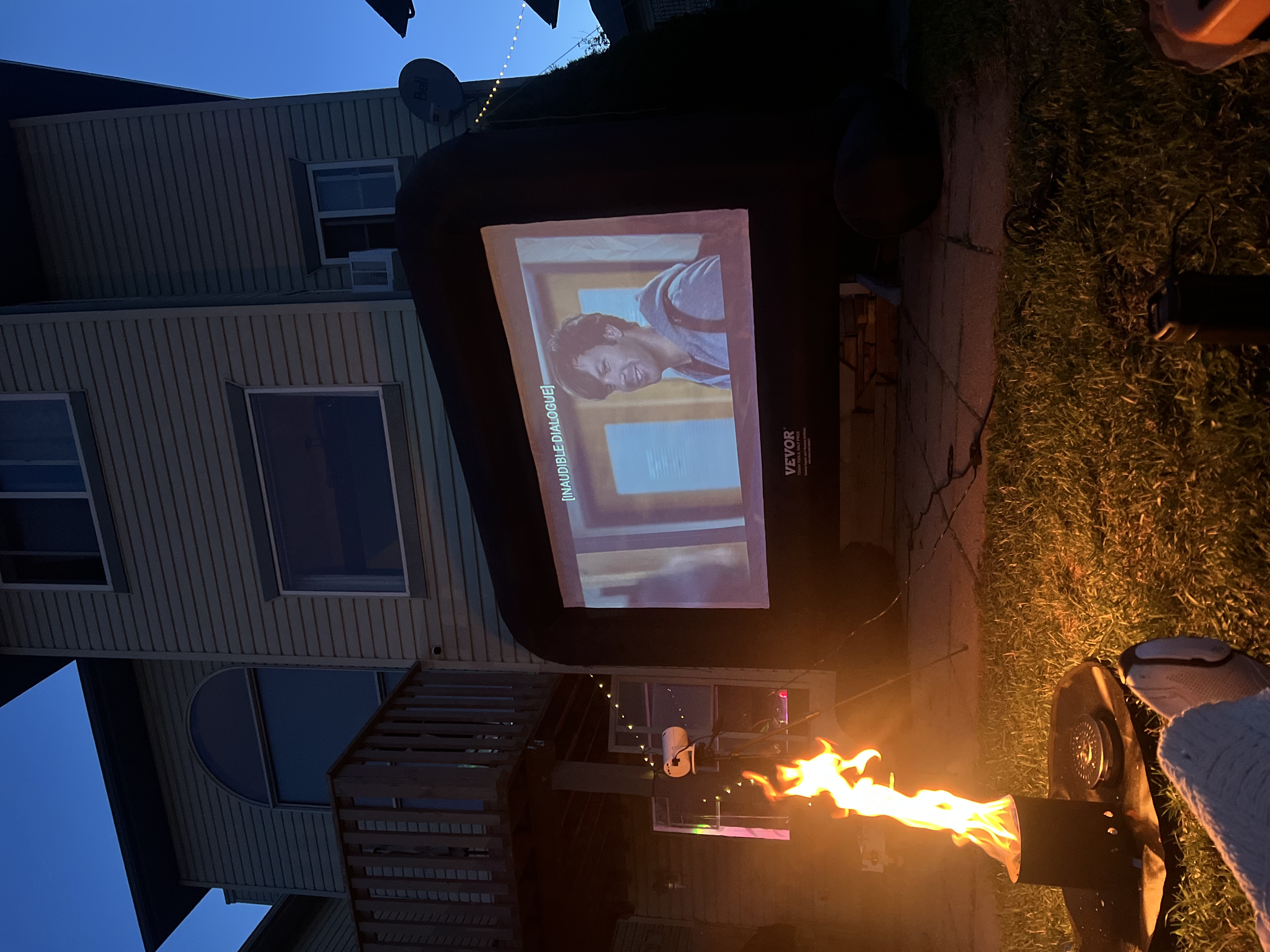 Outdoor cinema with string lights